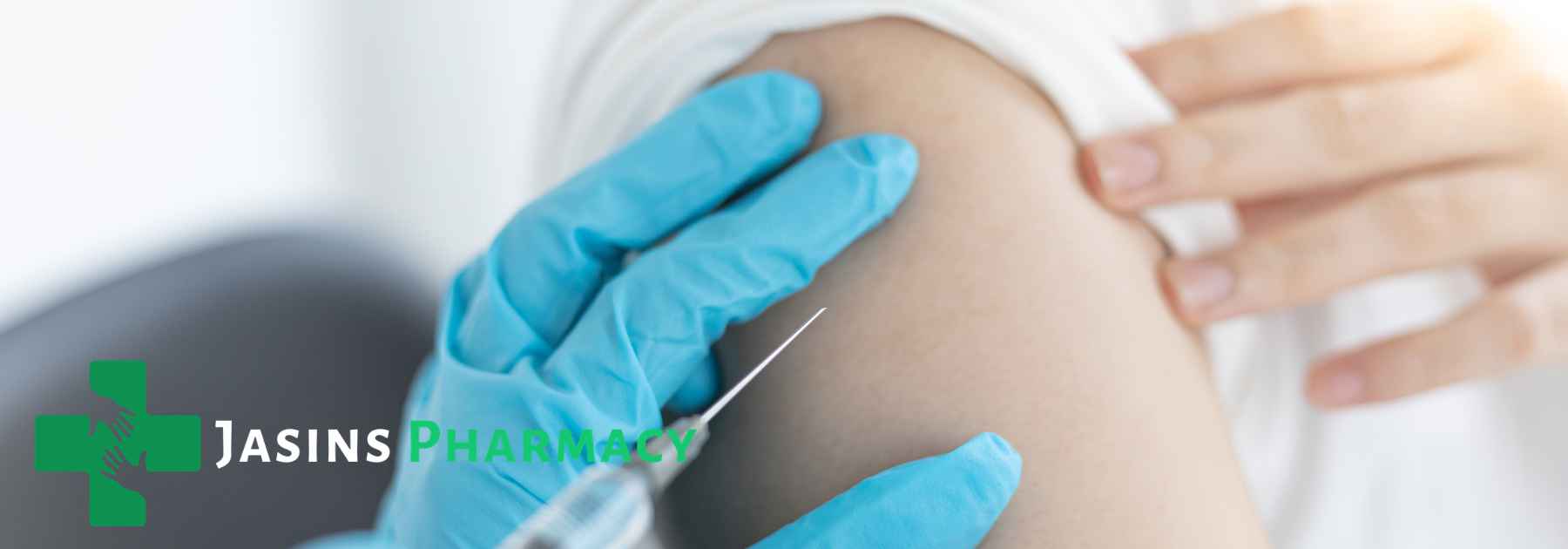 patient in white shirt receiving vaccine