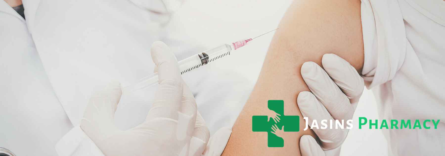 patient in white shirt receiving vaccine