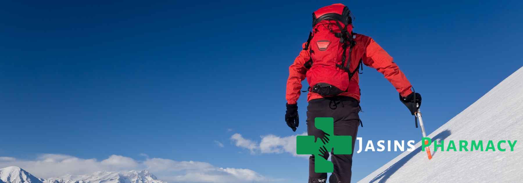 mountain climber with red rucksack